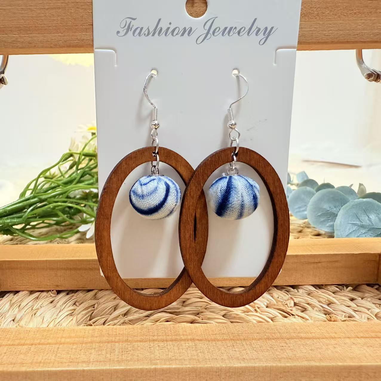 

Yunnan Ethnic Dangle Earrings: Dali Tie-Dye Indigo Fabric with Retro Pan Kou Design
