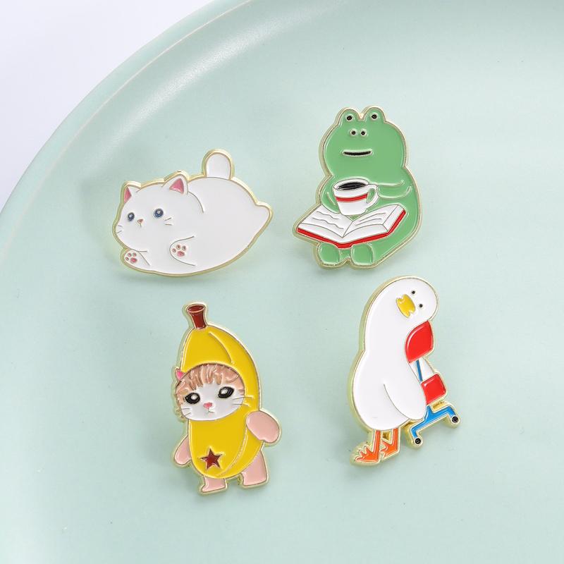 Cute Banana Cat Enamel Pins Chubby Kitten Lazy Duck Reading Book Frog With Coffee Funny Animal Brooches Lapel Badge Jewelry Gift