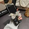 Applicable to Samsung ZFlip6 rhinestone bow flash diamond case zflip7 folding screen all-inclusive luxury bracelet protective case