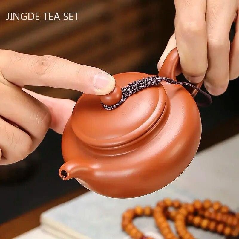 Starožitná fialová hliněná čajová konvička Surová ruda Zhu Mud Konvička Xishi Ručně vyráběná kulová dírka Filtr Beauty Pot Tradiční čajové sady Zisha