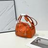 New leather pillow bag women's bag one-shoulder hand-held fashionable and versatile temperament mature woman bag
