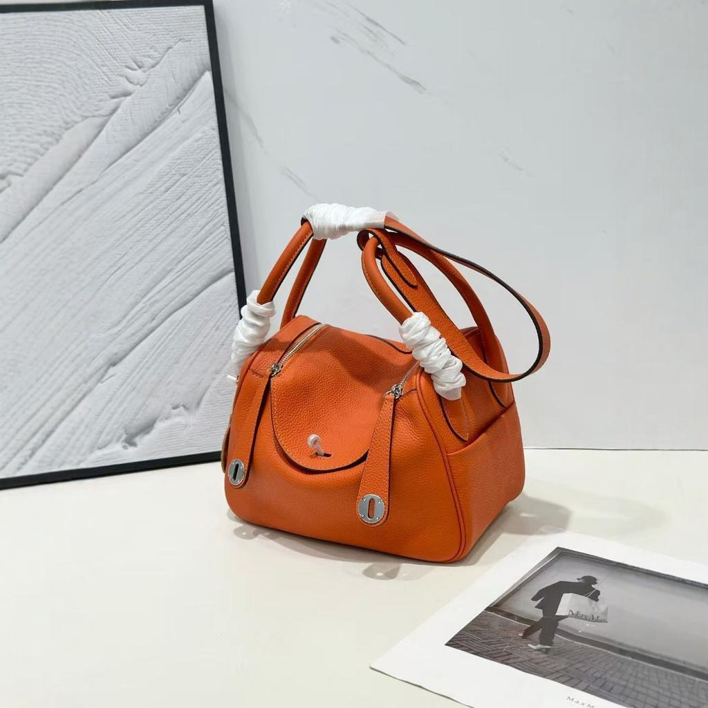 New leather pillow bag women's bag one-shoulder hand-held fashionable and versatile temperament mature woman bag
