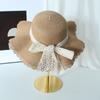 Straw hat female lace bow large brim foldable sunscreen visor seaside beach sweet bucket hat