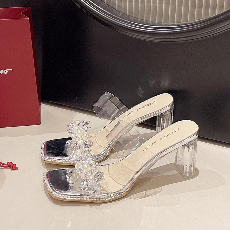 Tempérament tendance avec talons épais en cristal mules cool vêtements d'été pour femmes 2025 nouveau à la mode bout carré bout ouvert beaux talons hauts