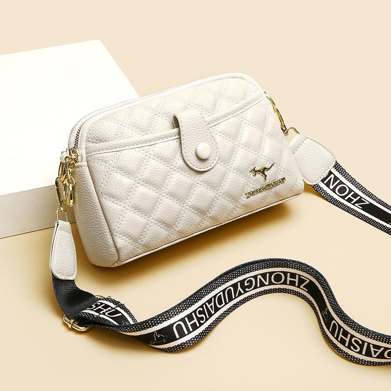 

2025 Высококачественная стеганая кроссбоди из кожи коко: Мягкая, маленькая квадратная сумка для женщин с двойными отделениями для телефона белый/кремовый