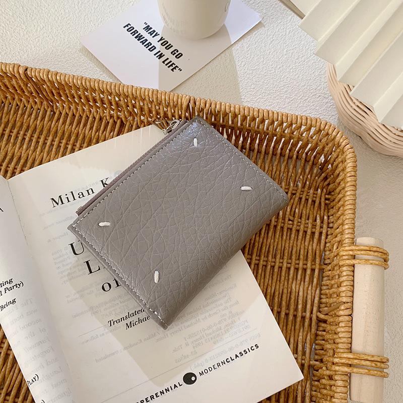Korean version of women's wallet ins women's small wallet women's high-end short wallet change bag solid color zipper hand-held