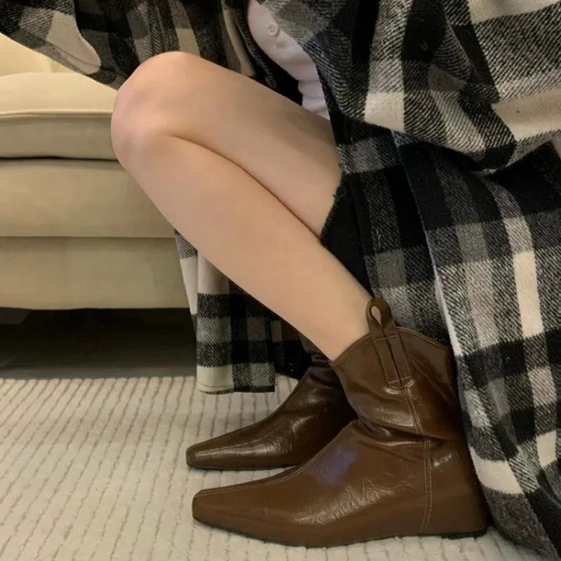 Fashion Skinny black 2025 autumn and winter style simple and versatile wedge heel heightened pointed toe women's booties