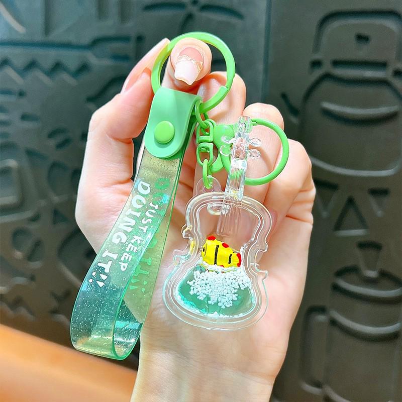 Exquisite Quicksand Panda Keychain: Cartoon Oil-Filled Doll Bag Pendant and Car Accessory