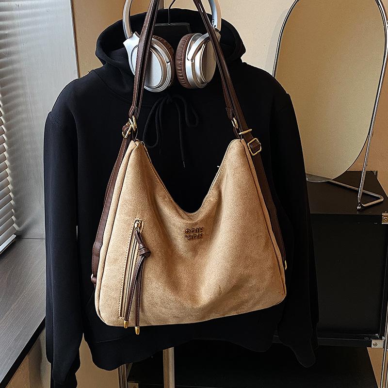 Lässige Pendler-Tragetasche Damen große Kapazität 2025 neue Schulter-Umhängetasche Retro-Mode leichter Rucksack