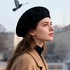 A Women's Beret Knitted Woolen Hat with Autumn and Winter Thick Ear Protection Wool Hat and Shiny Diamond Decoration