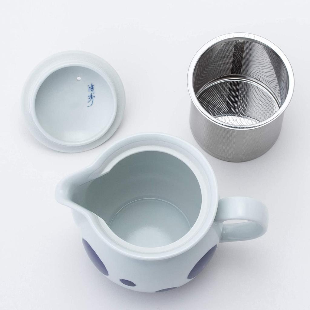 This 10cm Diameter, 450ml Teapot Features a Rounded Shape and Numerous Large and Small Circular Patterns. It Includes a Super-fine Stainless Steel