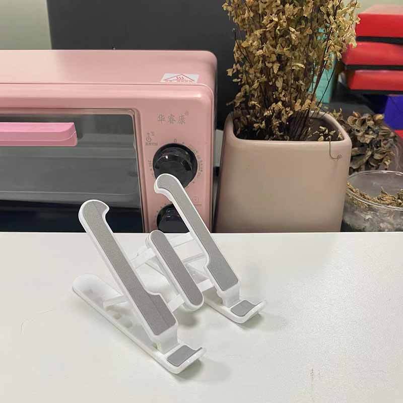 

Подставка для ноутбука Складная, подъемная, портативная, стойка для рассеивания тепла поднята, стойка для хранения отрегулирована, стойка для хранения устойчива White only for phones