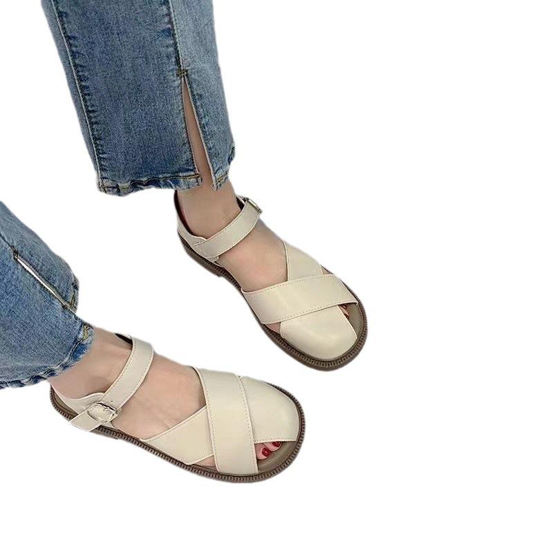 Baotou sandals women's summer 2025 versatile outer wear comfortable hollow cross belt women's shoes flat Roman shoes