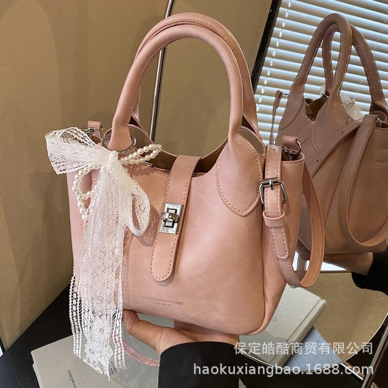 High-end foreign-style portable bucket bag women's 2025 new fashion spring and summer popular Korean version of shoulder messenger bag