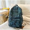 Schoolbag schoolbag female burden reduction large-capacity backpack male can hang tie rod college student travel commuter backpack tie-dye bag