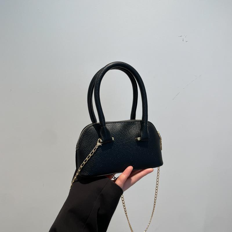 

Сумка-ракушка Женская сумка-мессенджер Модный тренд Универсальный однотонный нишевый высококлассный новый повседневный плечевой мешок чёрный