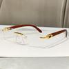 New frameless trimmed personalized sunscreen sunglasses catwalk travel fashion versatile wood grain legs advanced sunglasses