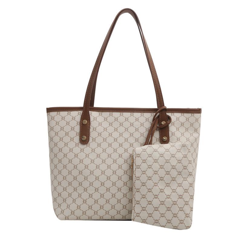 

Large-capacity bag women s commuter personalized tote bag new beautiful niche trend shoulder bag textured women s bag білий