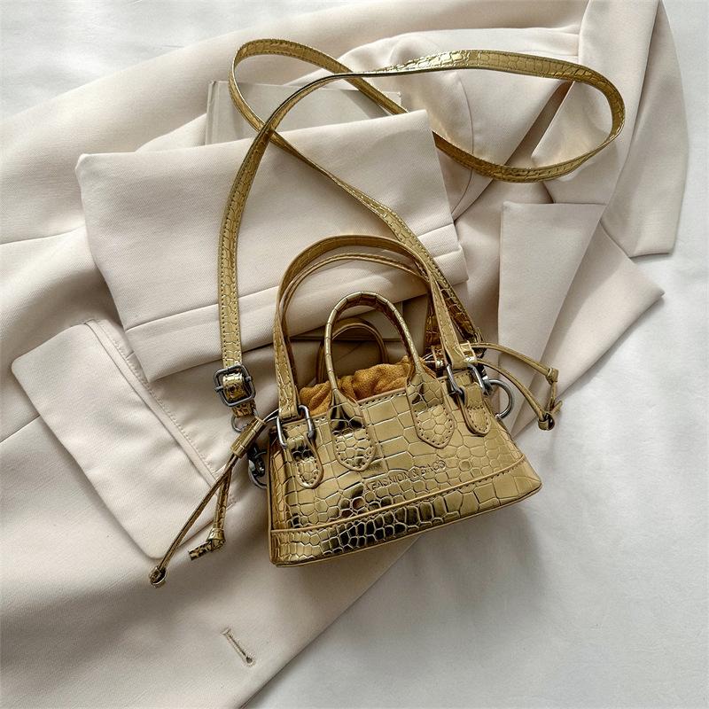 Niche design small bag women's spring new fashion simple hand bag casual commuter messenger bag women's bag