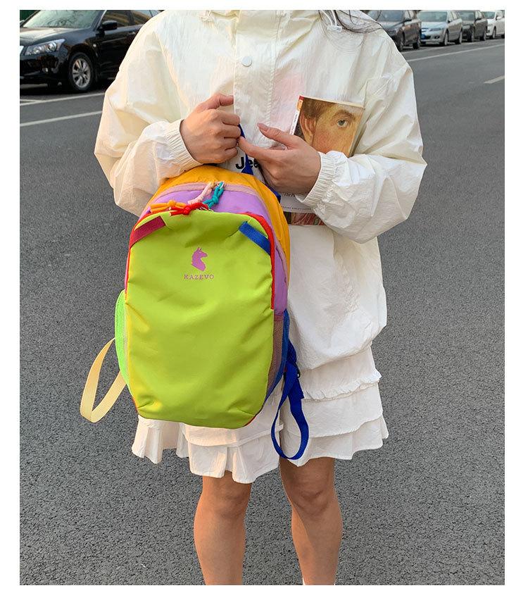Zaino nuovo portatile colore a contrasto dopamina stile antivento anti-schizzi zaino da viaggio studente classe zaino da esterno per uomo e donna