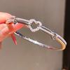 Luxury Heart Pendant Bracelet With Zircon Embellishments In Gold Finish For Spring 2026 Fashion