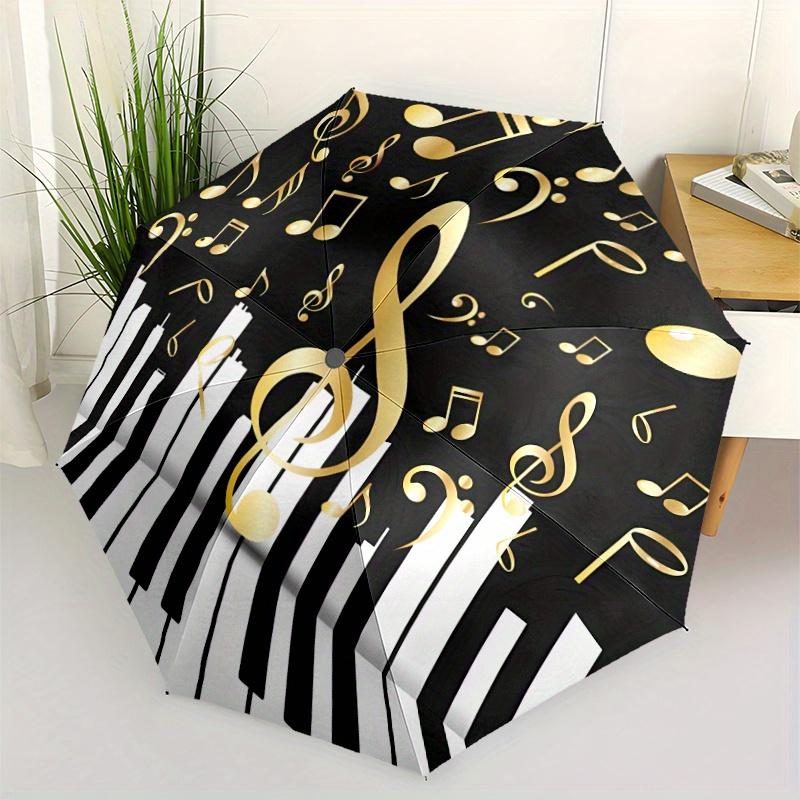 

Music Notes & Piano Keys Umbrella - Automatic Open/Close, Shielding, Sturdy 8-Rib Frame, Elegant Black & Golden Musical design