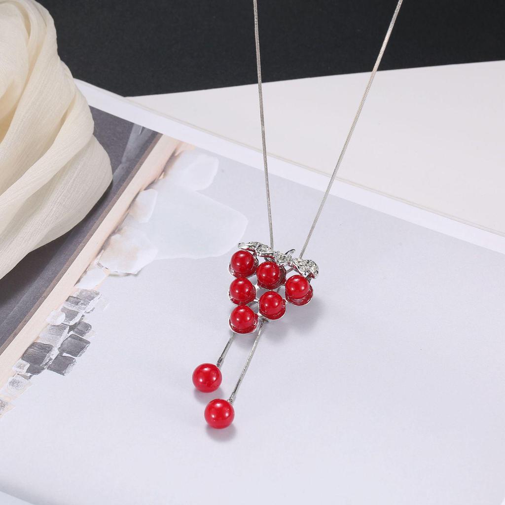 Luxury Non-Fading Korean Fashion Sweater Necklace: Autumn/Winter Women's Niche Design Pendant