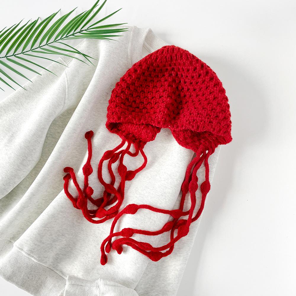 Sweet hollow knitted bag head hat autumn and winter travel photo single product fringed strap red knitted wool hat women