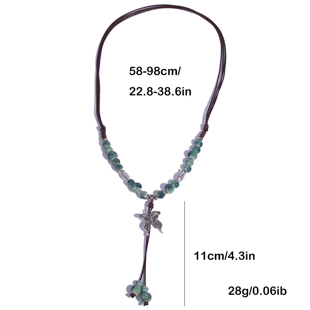 Etnisk stil keramik lång tröjkedja, handgjort vävt hänge för kvinnor, fjärilshalsband i konstnärlig stil