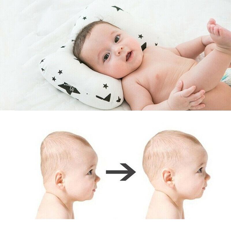 Il cuscino in cotone per neonato previene il posizionatore del cuscino antirollio per neonato a testa piatta