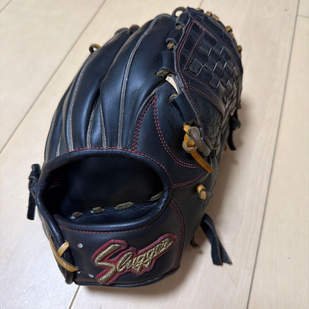 Used Kubota Slugger hardball gloves
