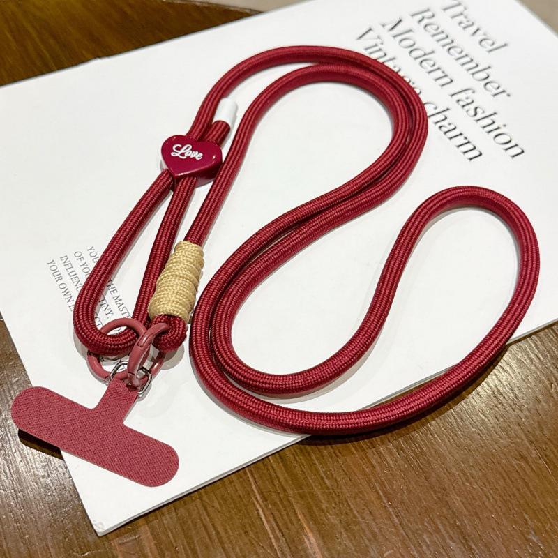 

Adjustable Heart-Shaped Woven Phone Lanyard - Wear as Crossbody, Shoulder, or Neck Rope for Travel.