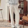 Женские брюки New Balance Спортивные брюки Вязаные спортивные штаны Женские Белые