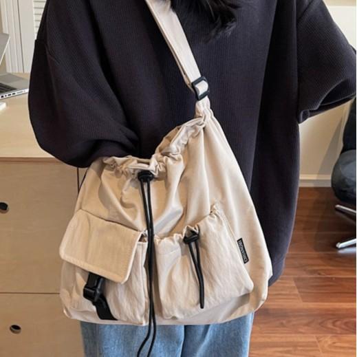 Korean Version of The Small Fresh Drawstring Bucket Bag Lady Solid Color Texture Nylon Shopping Bag Cute One-shoulder Messenger Bag