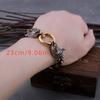 One Viking wolf head stainless steel chain bracelet, a cool hip-hop retro men's accessory, a punk fashion men's amulet bracelet.