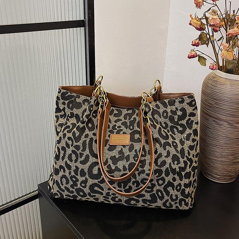 

Новые модные сумки-шопперы и дорожные холщовые сумки Новые популярные женские сумки Большая вместимость Леопардовые сумки через плечо 35x12x28cm чёрный