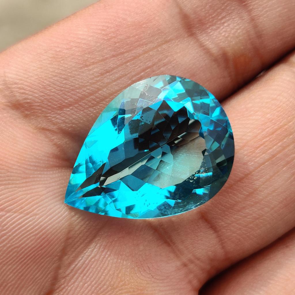 Pear Cut Sky Blue Topaz Shade Glass Stone, 21.95 Carat, 24x18x10 MM Size Pear Shape Stone.