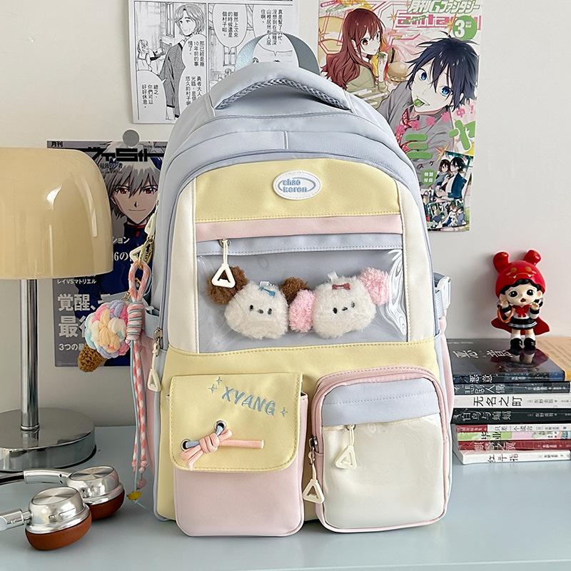 The new schoolbag is high-value, fresh and sweet, contrasting colors, splicing, and early high school students' lightweight travel backpack.