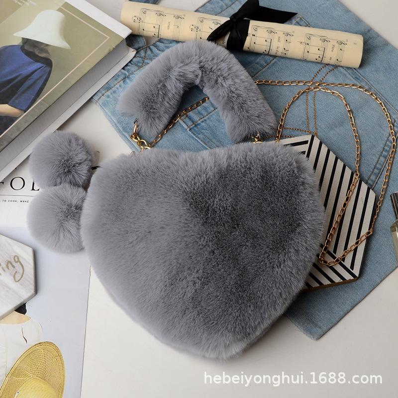 Herbst und Winter neue tragbare Liebeswolle Tasche Mode Kette Umhängetasche Plüschtasche Herztasche rote Fell Strohtasche Handtrage