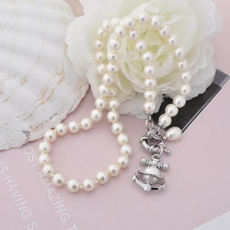 Empress Dowager Saturn Pearl Necklace, Bracelet, and Earrings Set: Light Luxury Punk Clavicle Chain for Women