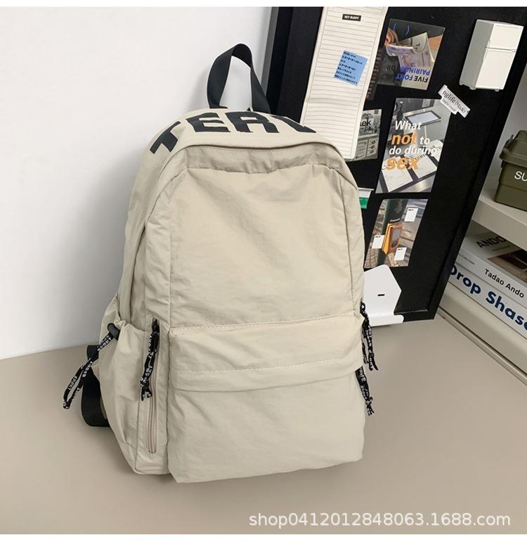 

Японский ленивый стиль дизайн школьный рюкзак большой вместимости повседневный универсальный модный рюкзак широкий плечевой ремень легкий водонепроницаемый рюкзак белый