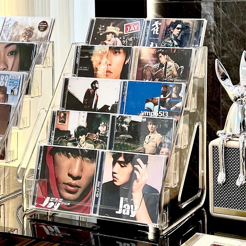 Vitrína na CD Domácí akrylový stojan na CD Albumy Úložný box na CD Úložný stojan na časopisy Albumy slavných zpěváků CD