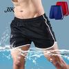 Men Loose Pants Summer Shorts Drawstring Elastic Waist Solid Color Sport Casual Thin Above Knee Length Beach Trousers Daily Jogging Sweatpants