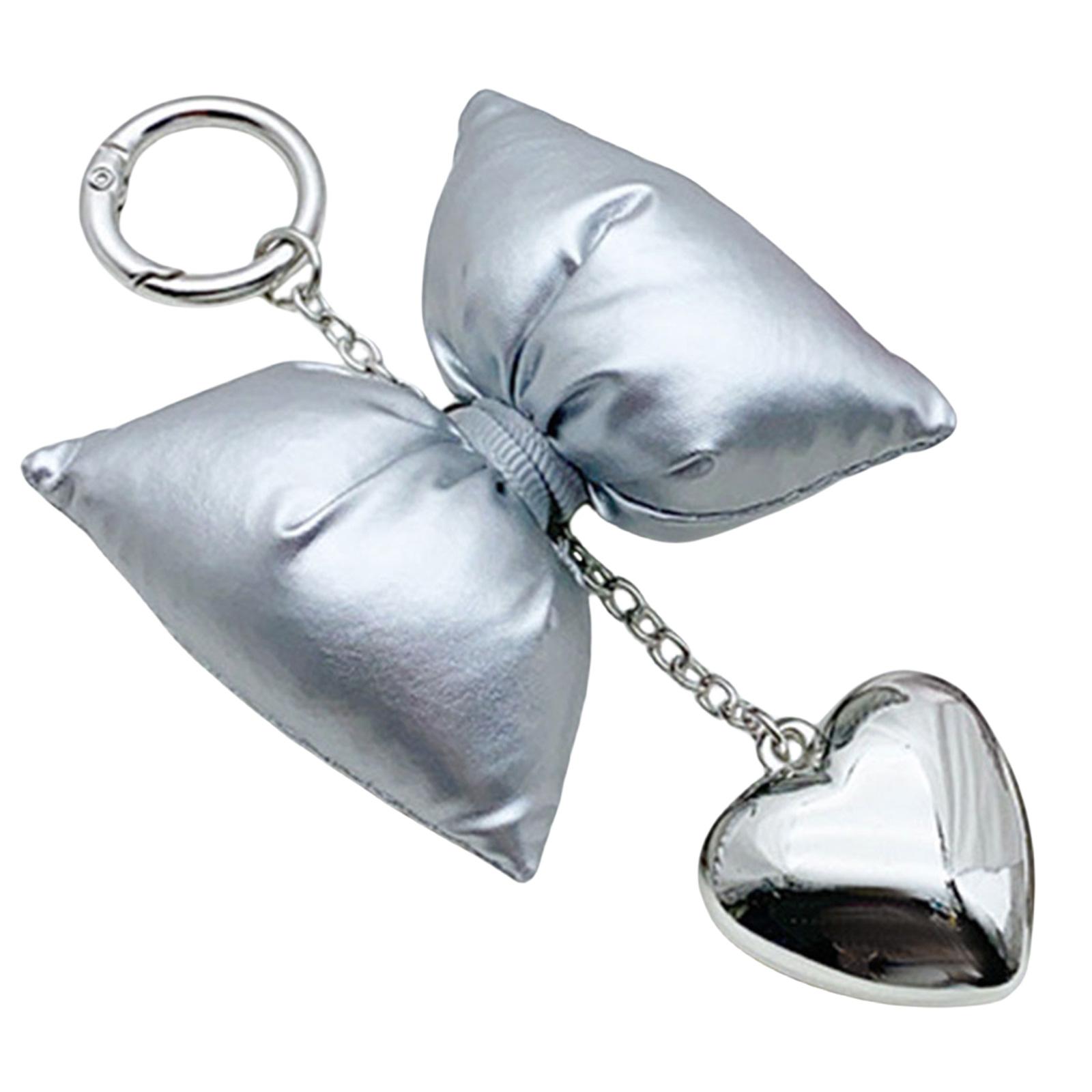 

Привлекательный кожаный бант с большим брелоком в виде сердца, изысканный брелок с подвеской в виде сердца и банта серебряный