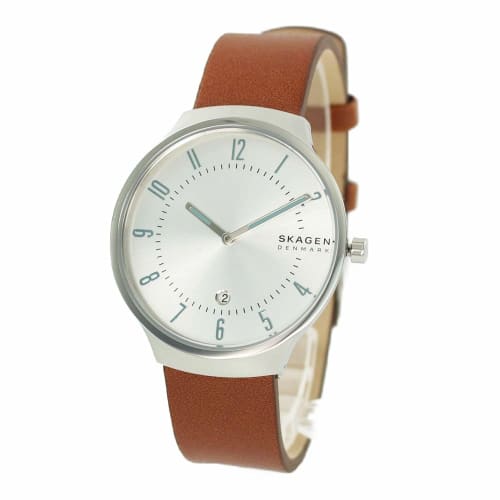 Skagen SKW6522, a simple, slim, Nordic-inspired watch by Grenen, with a silver dial and brown leather strap.