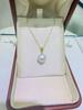 Aurora Freshwater Pearl Necklace: 10-11mm Perfectly Round Pearls with 18K Gold Pendant & Silver Chain.