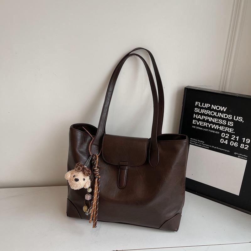 

2025 autumn new large-capacity tote bag fashion casual women s bag class canvas bag commuter shoulder bag no pendant темно-коричневого