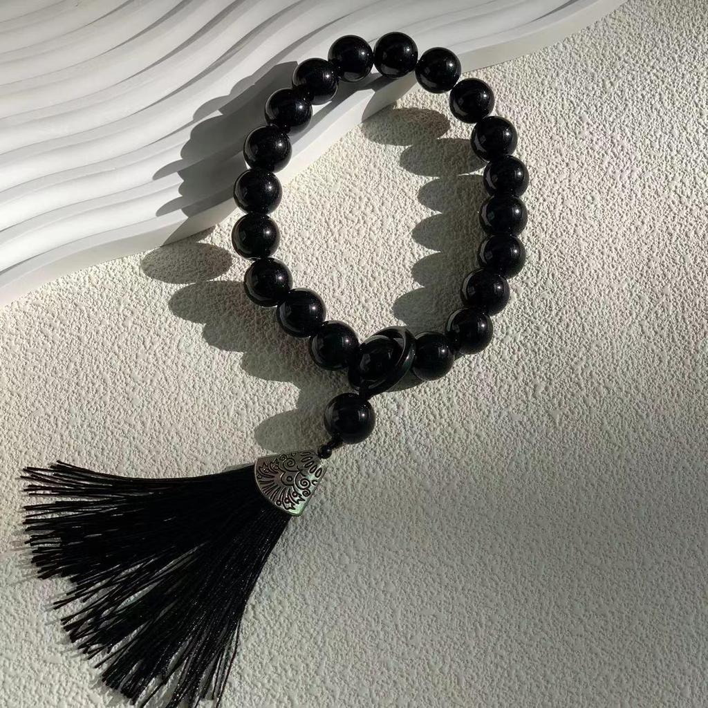 Obsidian Gradient Tassel Jade-Style Phone Charm with Antique Lion Dance Design