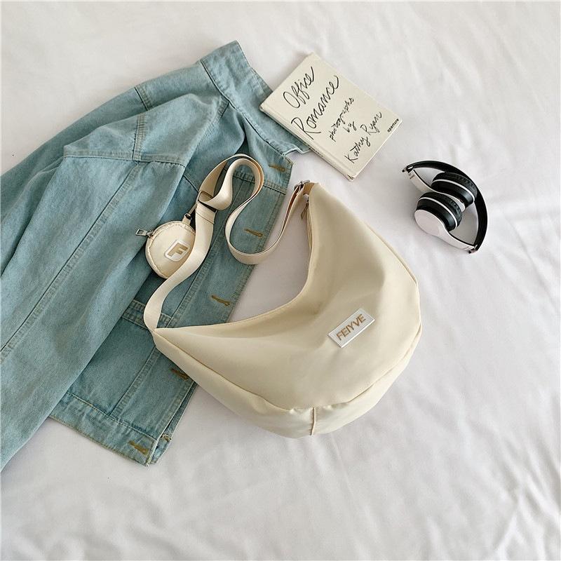 IELGY nylon dumpling bag, Japanese versatile messenger bag, casual large-capacity canvas class shoulder commuter bag