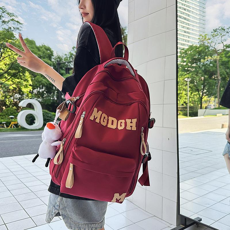 School bag, large capacity, multi-layer, junior high school boys and girls, backpack, burden reduction, spine protection, lightweight